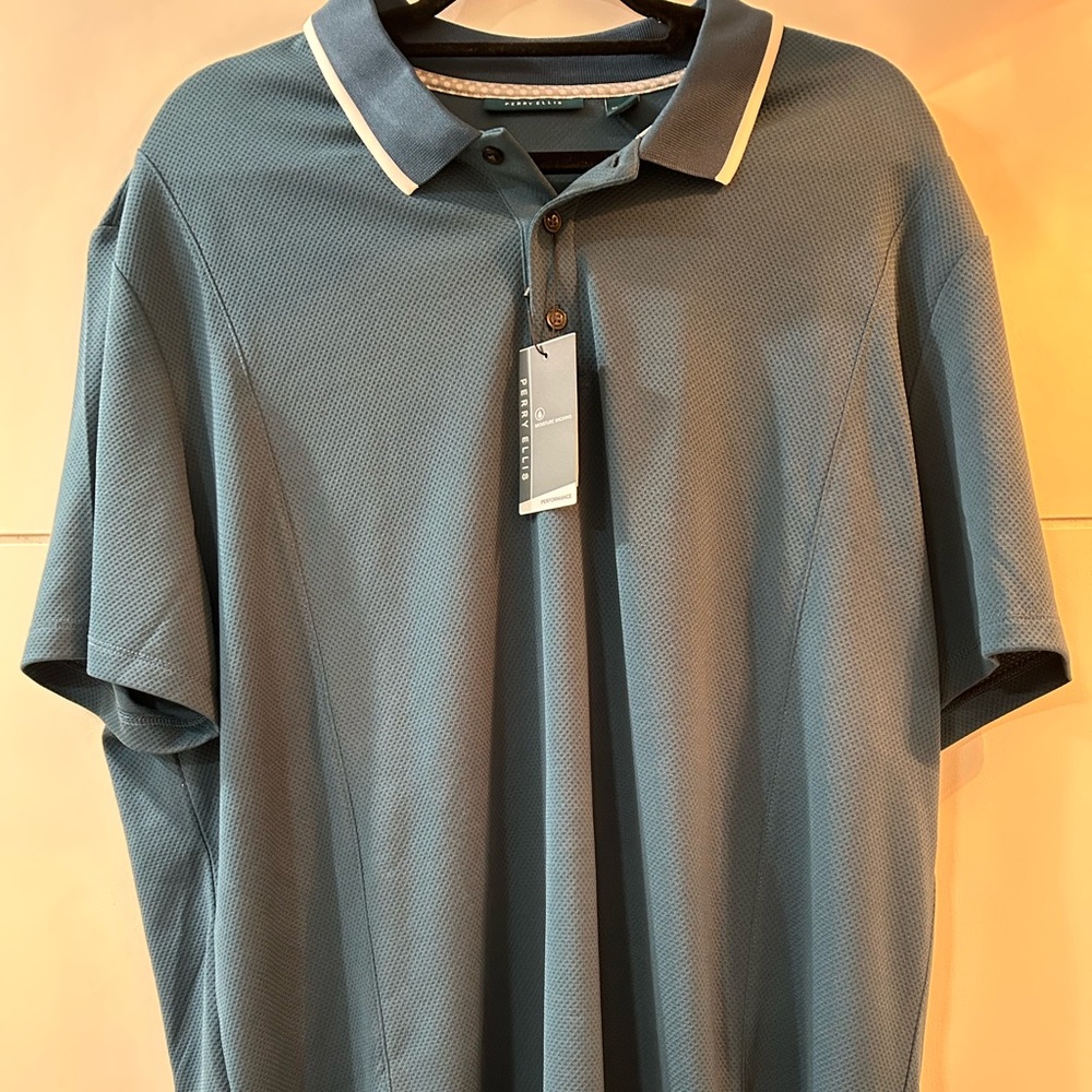 👕 Perry Ellis Polo never worn teal with white Trim.